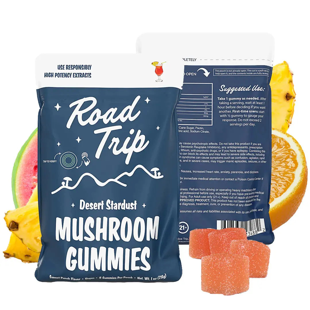 Road Trip Desert Stardust mushroom gummies Sunset Punch flavor pouch with tropical fruit gummy candies, pineapple orange and watermelon imagery, psychedelic inspired mushroom edible packaging, and premium fruit flavored gummy display